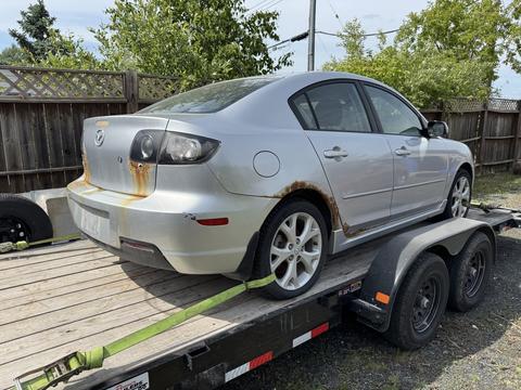 CashForCars Canada | Mazda3 Junk Car Removal for Scrap Metal Recycling