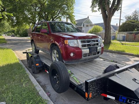 CashForCars Canada | Ford Escape on Trailer for Junk Car Removal