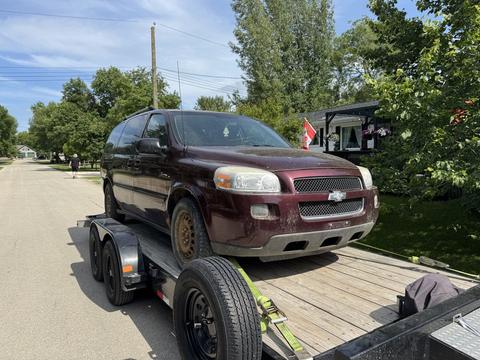 CashForCars Canada | Chevrolet Uplander Junk Car on Trailer for Recycling