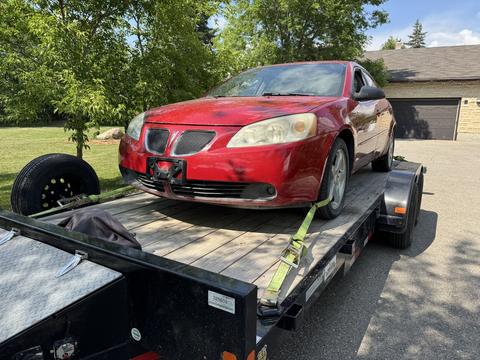 CashForCars Canada | Pontiac G6 on Trailer for Junk Car Removal