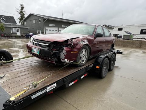 CashForCars Canada | Junk Car Removal of a Damaged Chevrolet Sedan
