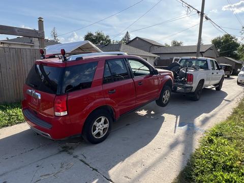 CashForCars Canada | Red SUV for Junk Car Removal and Recycling